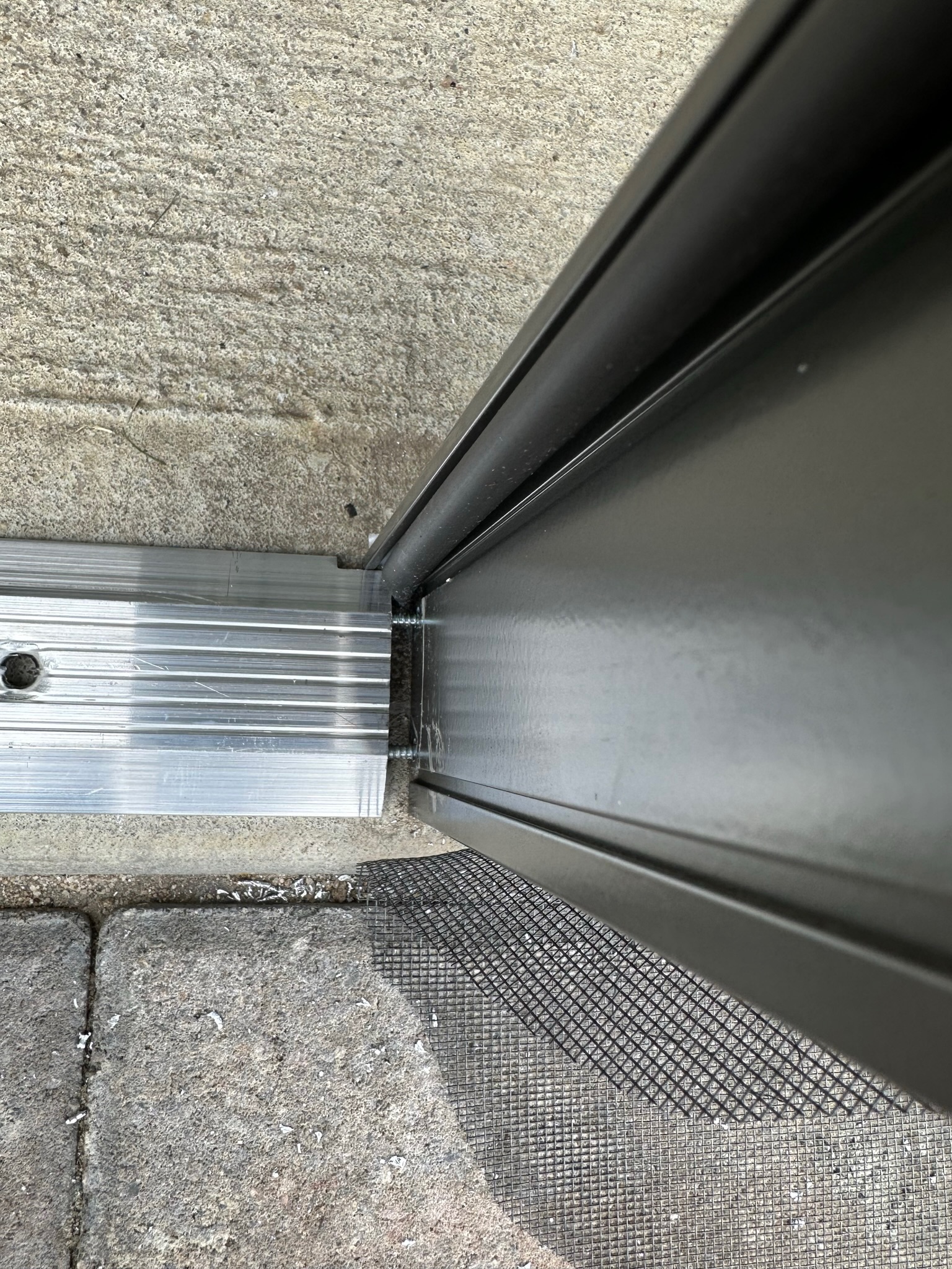 Lower sweep and threshold detail on an Eze-Breeze CD90 Cabana door.