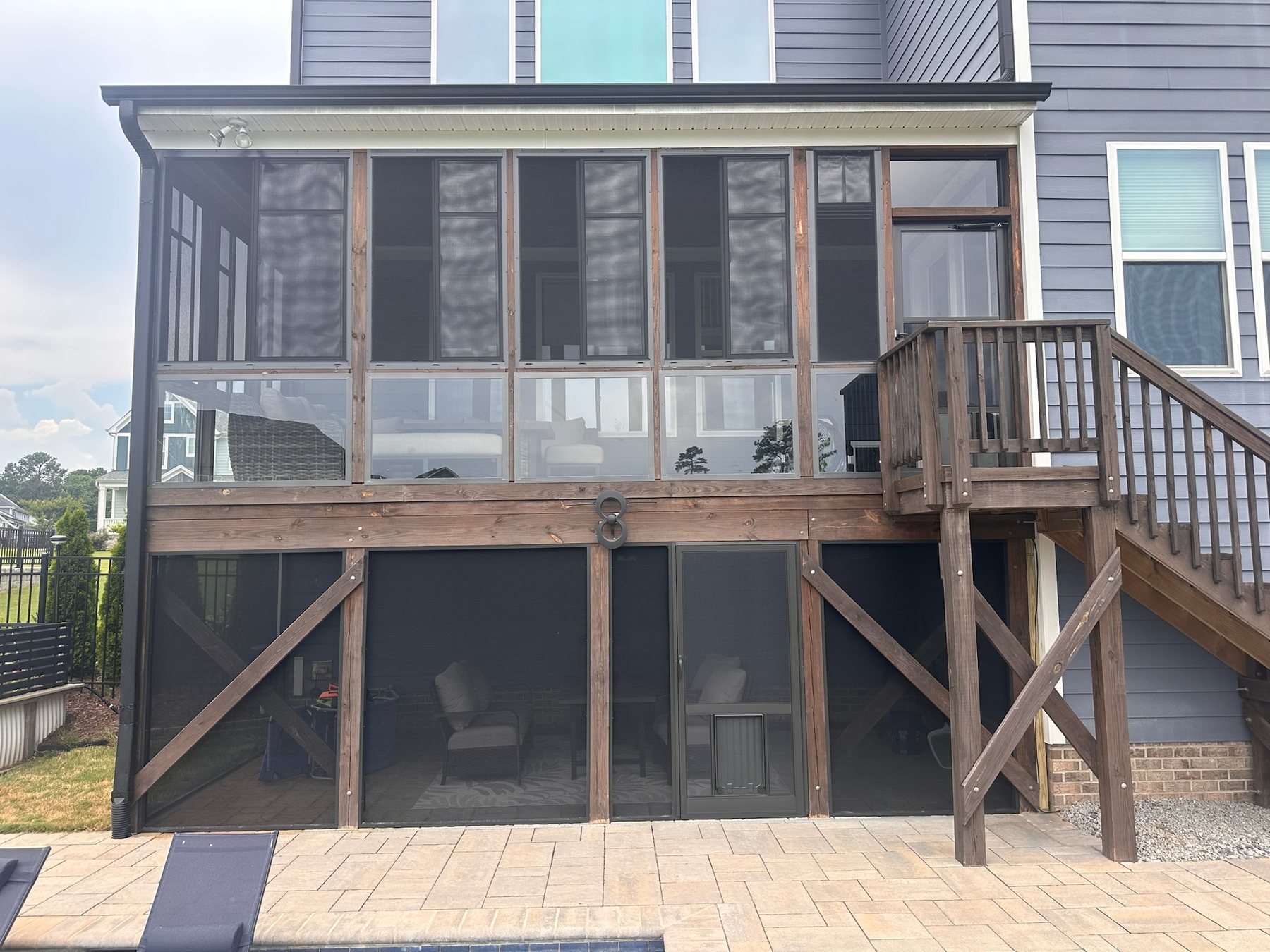 Completed Best Screens CWS glass porch enclosure in Holly Springs, North Carolina.