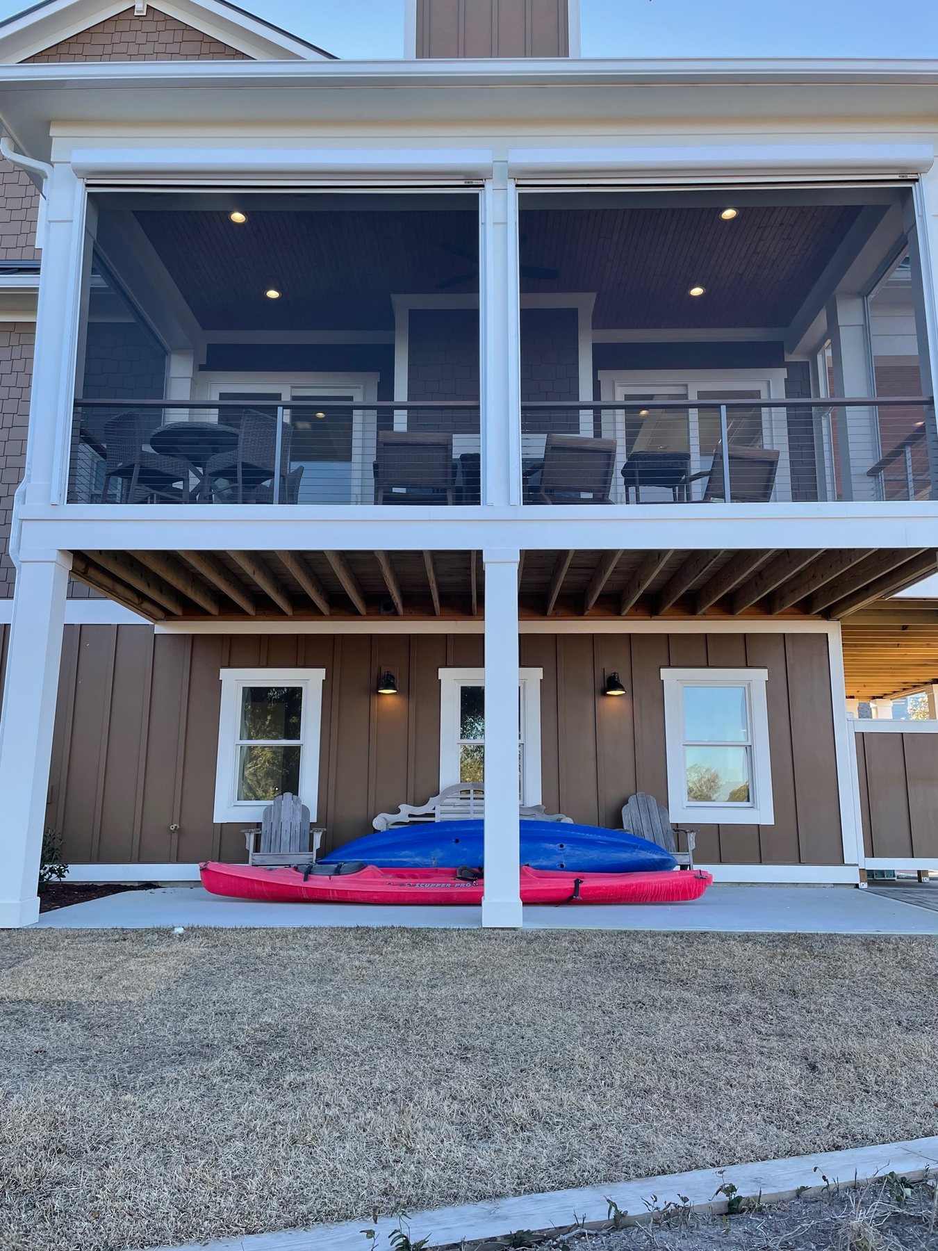 Exterior view of an elevated porch enclosed with the ScreenEZE screening system in Indian Beach, North Carolina.