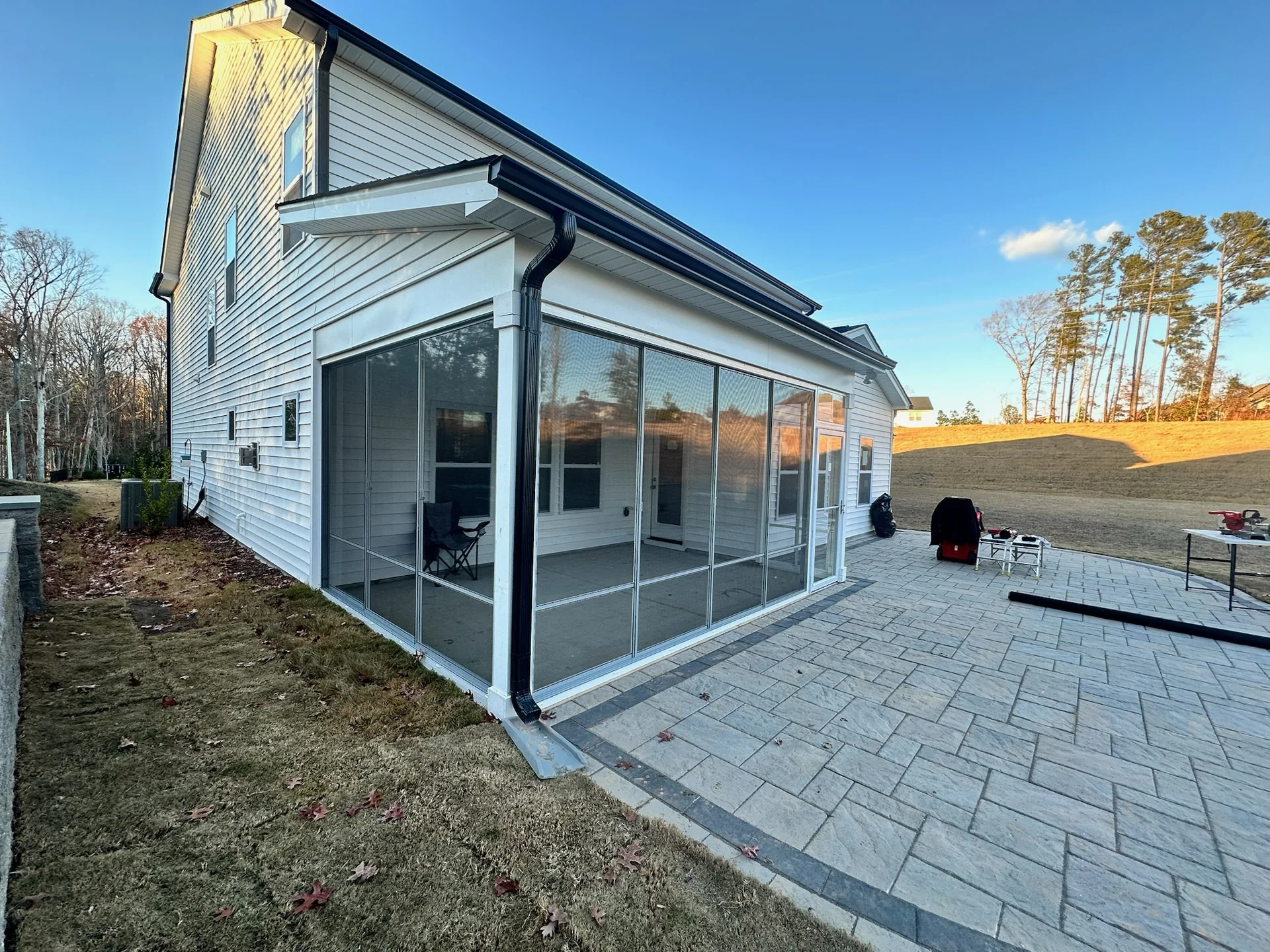 Eze-Breeze flexible-vinyl porch windows installed in a completed enclosure.