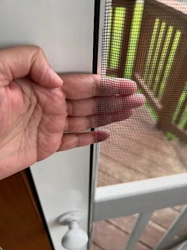 Close view of standard fiberglass screen mesh installed by Best Screens.