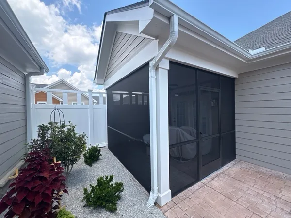 Standard No-See-Um screen mesh installed in bronze extruded-aluminum porch framing.
