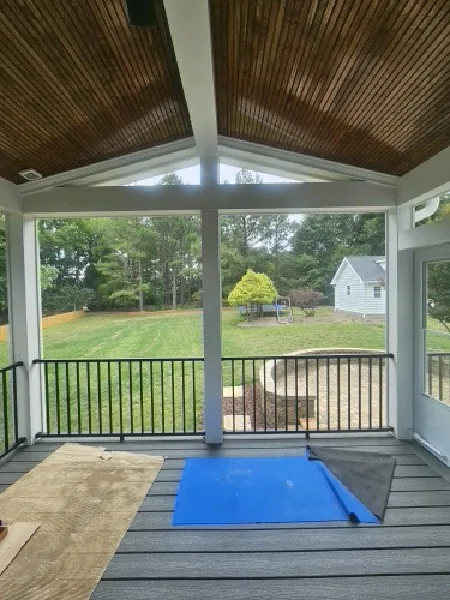 BetterVue screen mesh installed in white ARC aluminum framing on an Apex porch.