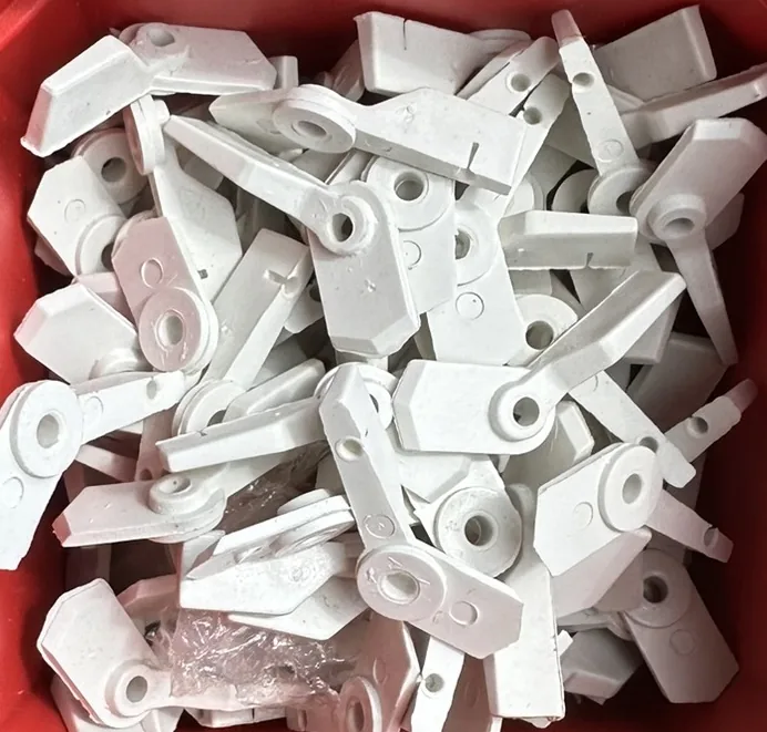 White swivel clips used as retention hardware on some half-window screens.
