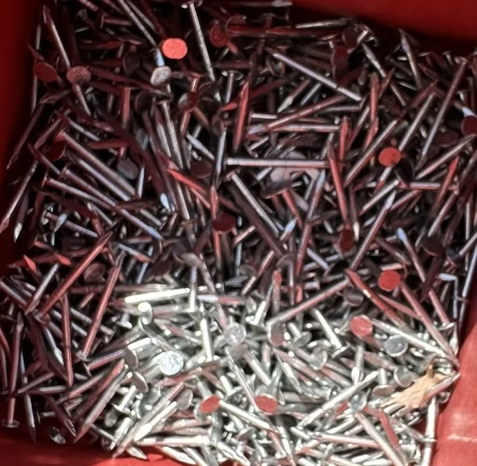 Small nails used to install window-screen friction hangers.