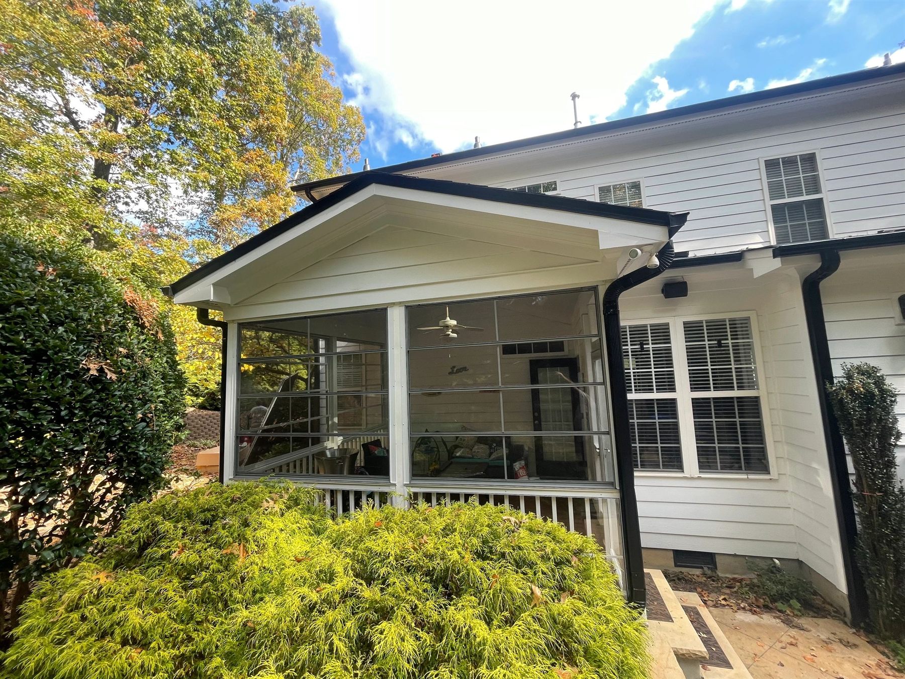Completed Eze-Breeze flexible-vinyl porch enclosure.