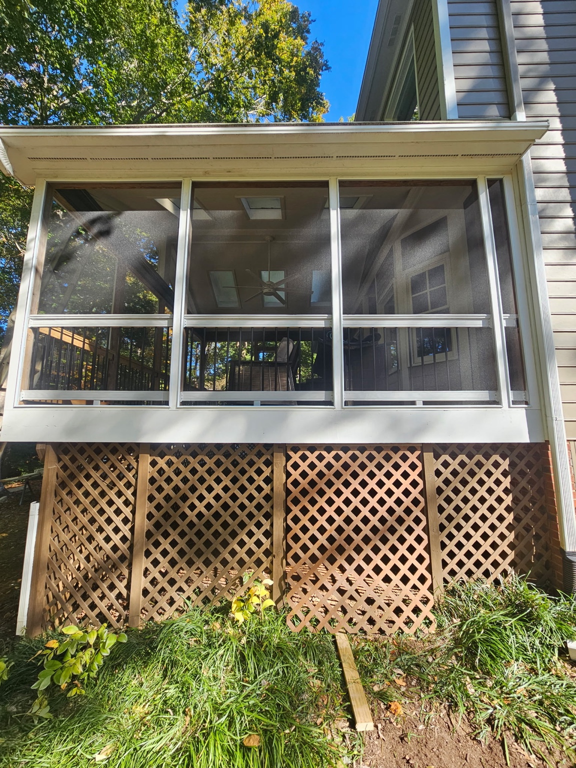 Completed ScreenEZE screened porch with large open views.