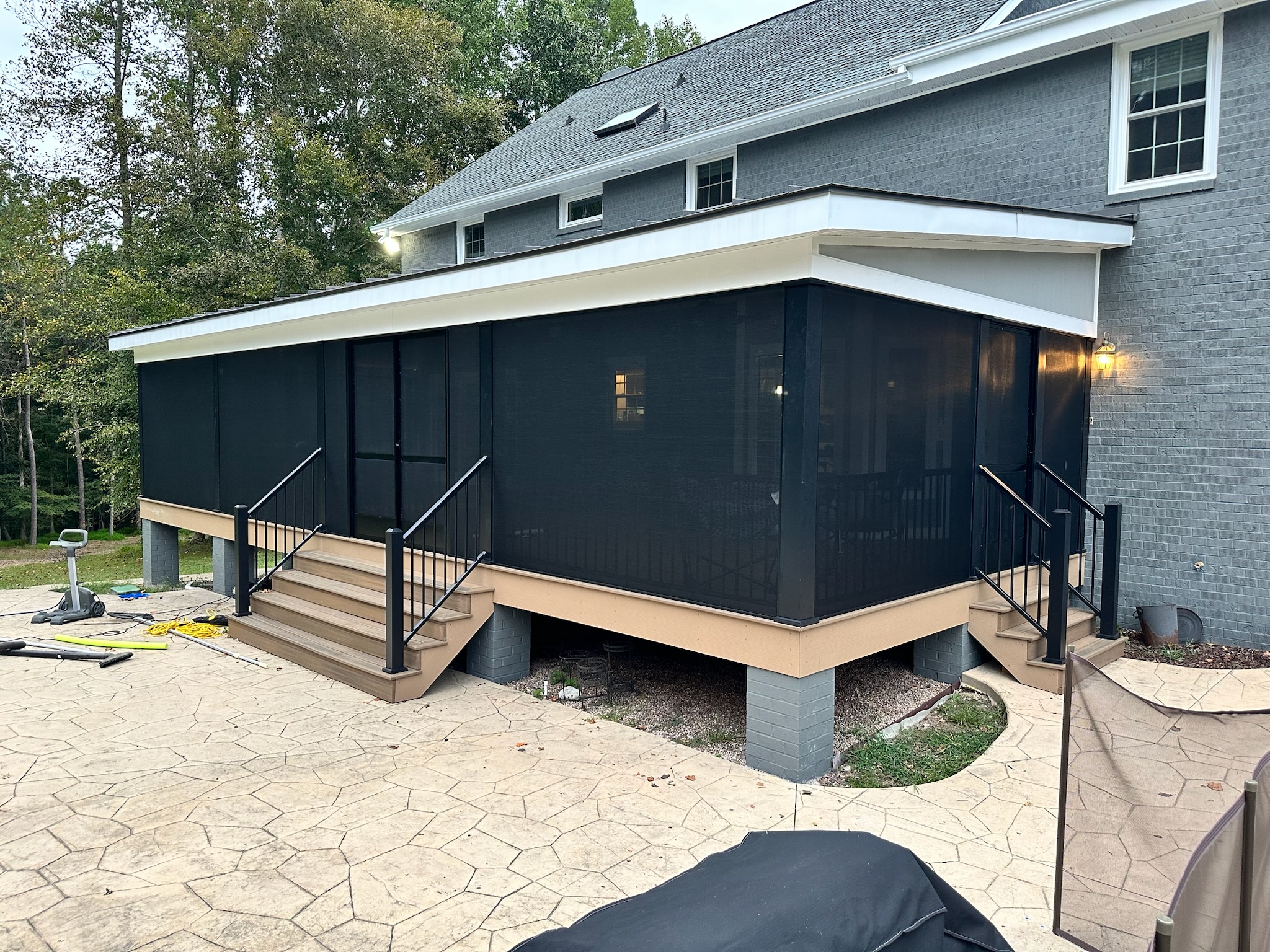 Black extruded-aluminum screen enclosure using SunTex 90 solar screen mesh.