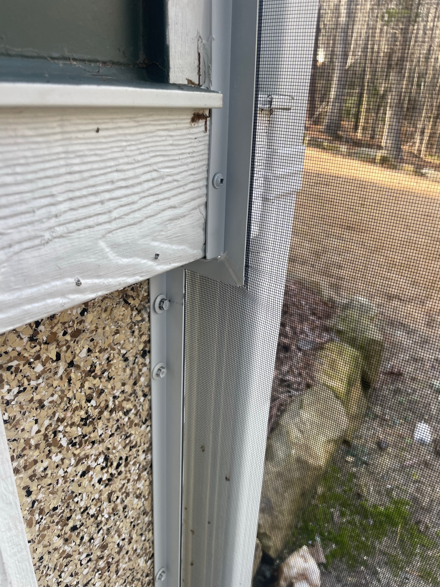 ScreenEZE cap installed over the mounting base to capture the mesh.