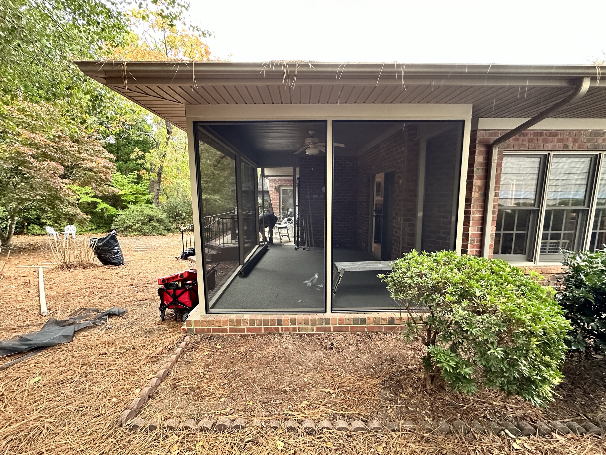 ScreenEZE installation spanning large porch openings.