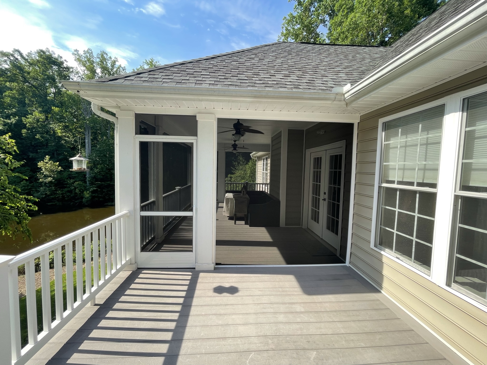 ScreenEZE porch opening with a sliding screen door.